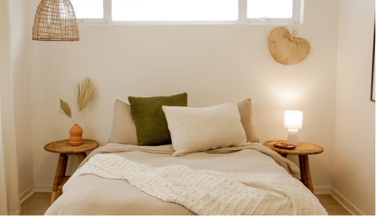 image of bedroom with nice pillows on the bed